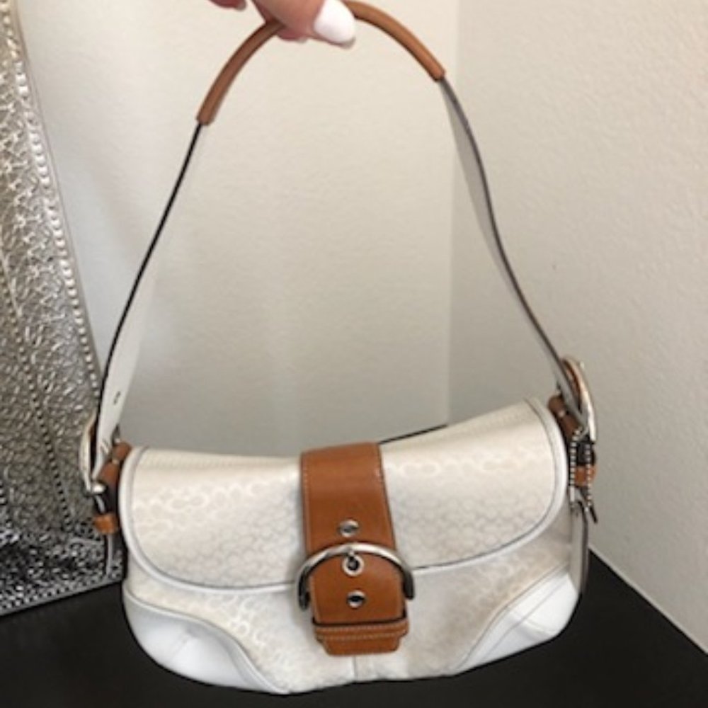 White and tan Coach purse